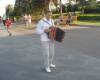 Гармонист играет на площади около памятника Салавату Юлаеву